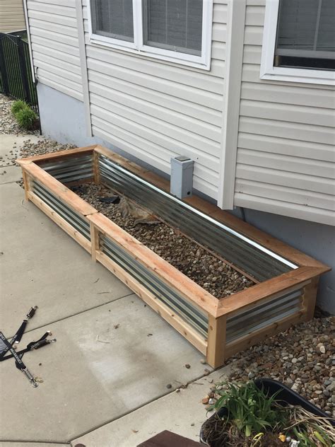 wood and corrugated metal planter boxes|corrugated metal raised garden bed.